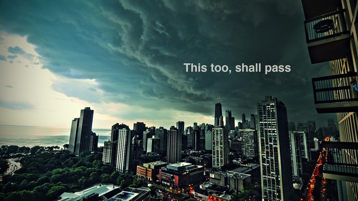 Chicago cityscape under stormy clouds with quote