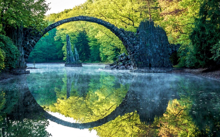 Rakotzbrücke bridge reflecting in the water
