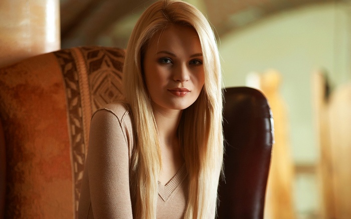 Talia Cherry sitting in a chair