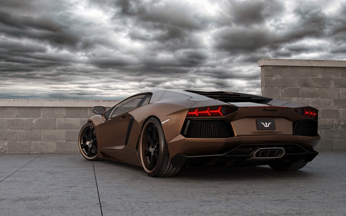 Brown Lamborghini Aventador parked on concrete