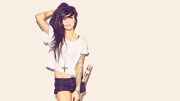 Valerie Poxleitner with tattoos and necklace