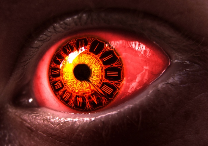Close-up of an eye with a clock iris