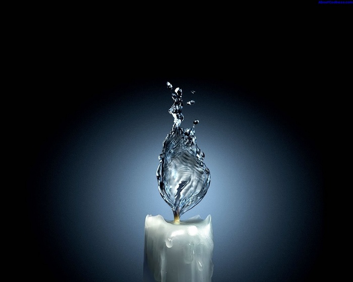 Water splash in the shape of a flame on a candle