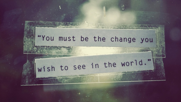 Motivational quote about change on paper