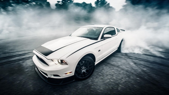 White Ford Mustang Drifting in Smoke
