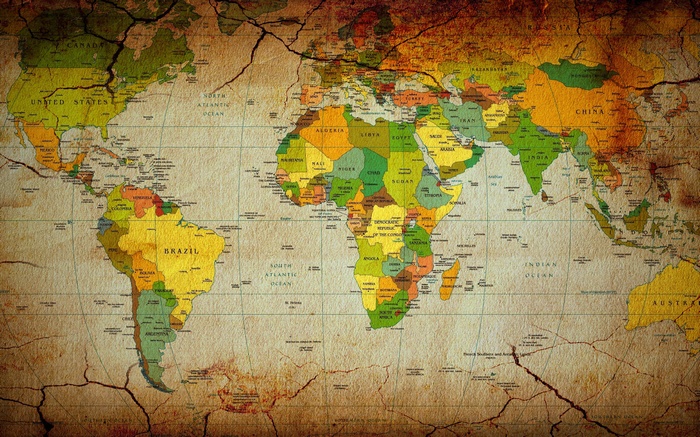 A vintage world map with cracked texture