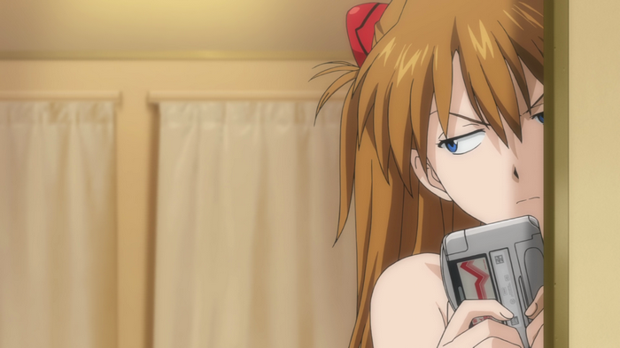 Asuka Langley Soryu holding a device