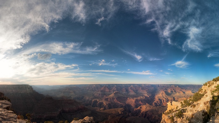 Grand Canyon landscape with dramatic clouds at sunset