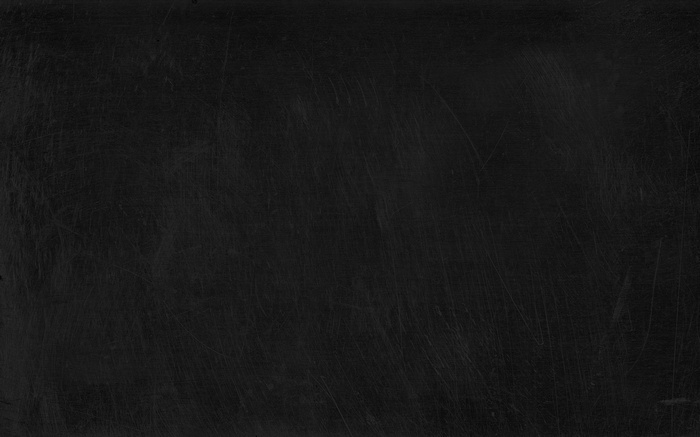 Dark textured surface with fine scratches