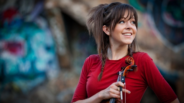 Lindsey Stirling with a violin