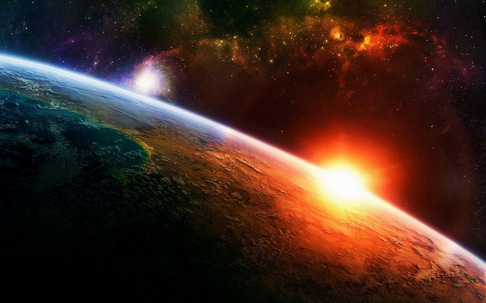 Sunrise over planet Earth in colorful nebula