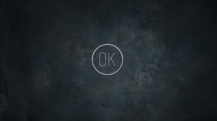 OK. logo on a dark textured background