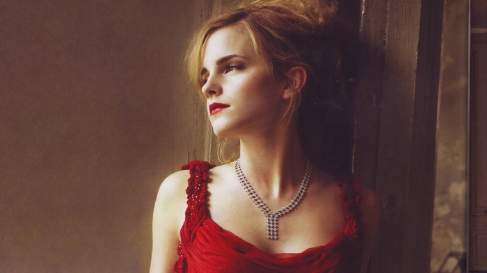 Emma Watson in a red dress wearing a necklace