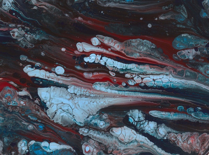 Abstract fluid art with red, blue, and white colors