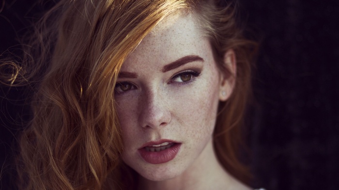 Hattie Watson, a redhead model with freckles
