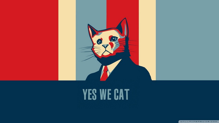 Cat in a suit with "Yes We Cat" text