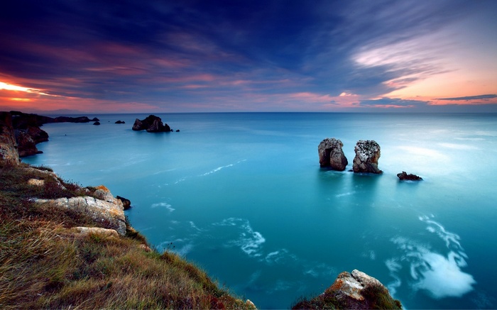 Sunset over the sea with rock formations