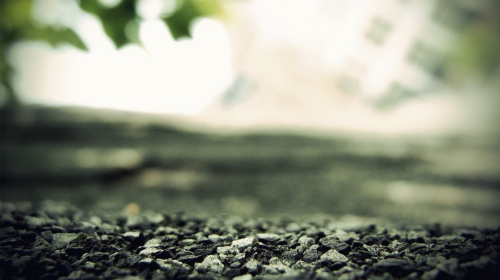 Close-up of small stones with blurred background