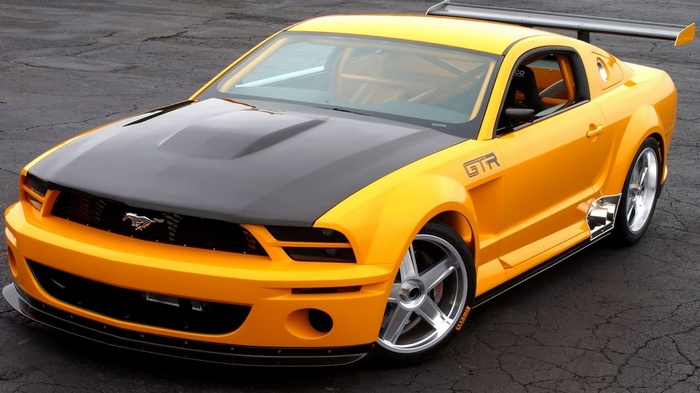 Yellow Ford Mustang GTR with a black hood