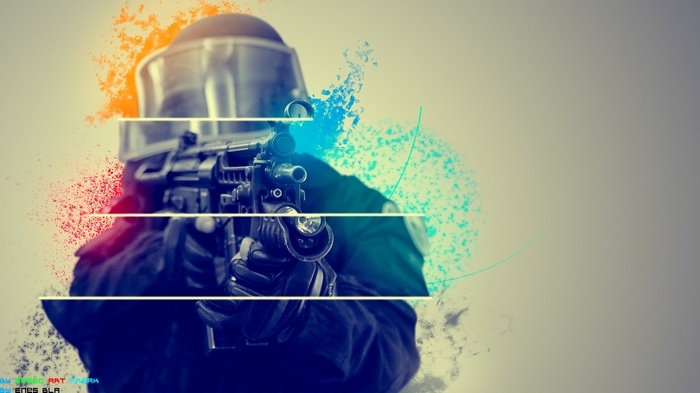 GIGN officer aiming a machine gun with colorful paint splashes