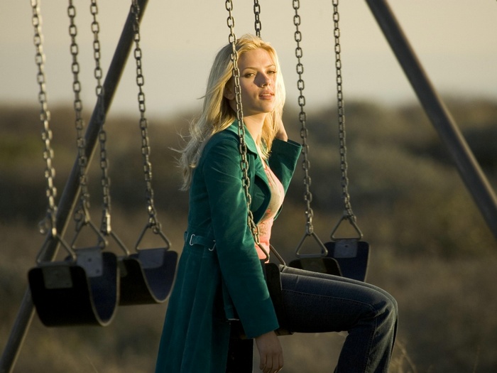 Scarlett Johansson on a swing set