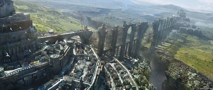 Fantasy city and castle built into a cliffside with a large bridge