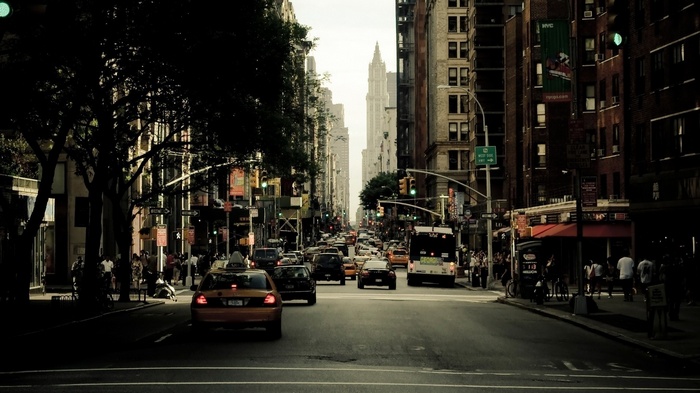 New York City street with traffic and buildings
