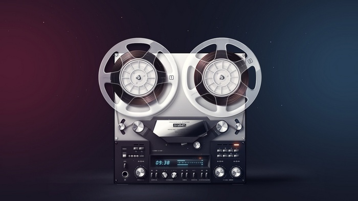 Vintage reel-to-reel tape recorder with two spools