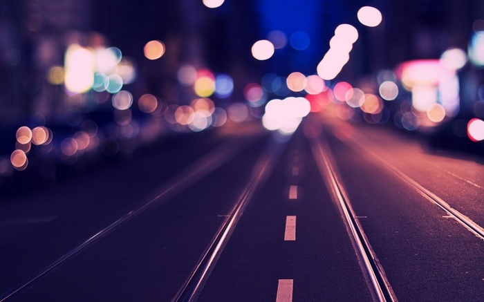 City road with bokeh lights at night