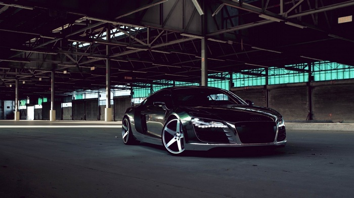 Black Audi R8 parked in a warehouse