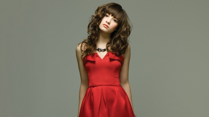 Demi Lovato in a red dress with a necklace
