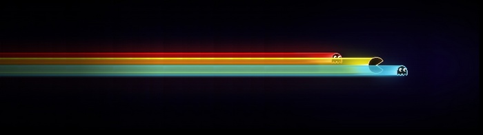 Pac-Man ghosts leaving trails on a dark background