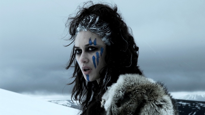 Olga Kurylenko as Centurion in a snowy landscape