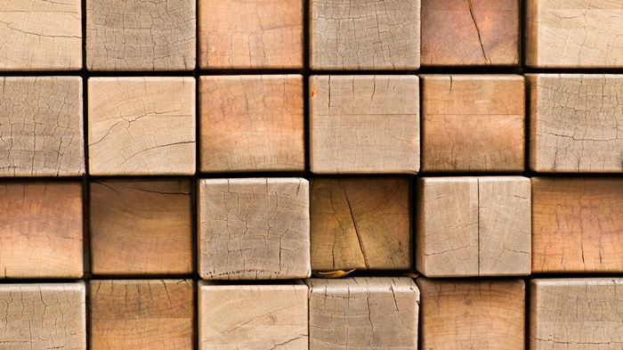Collection of wooden cubes with cracked texture