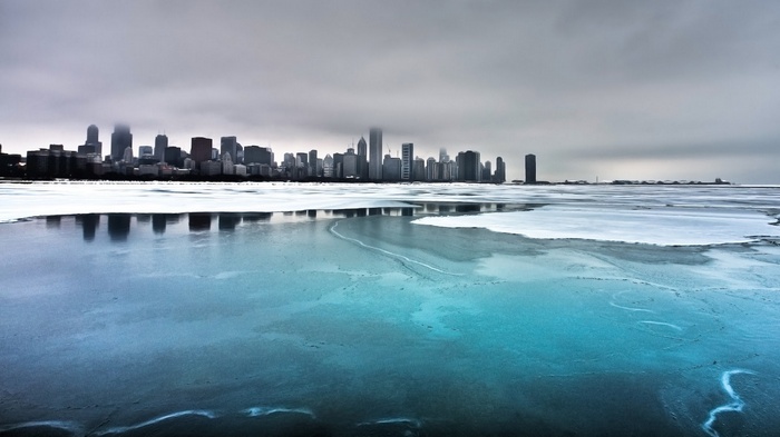 Chicago cityscape over frozen lake in winter