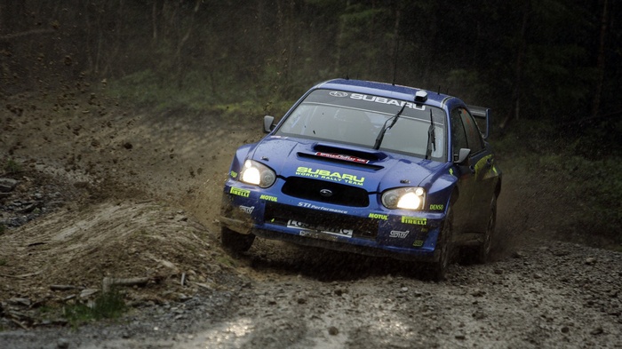 Subaru World Rally Team car on a dirt track