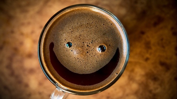 Top view of a smiling coffee cup