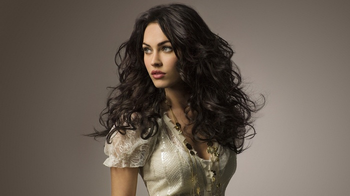 Megan Fox posing in a sparkly top