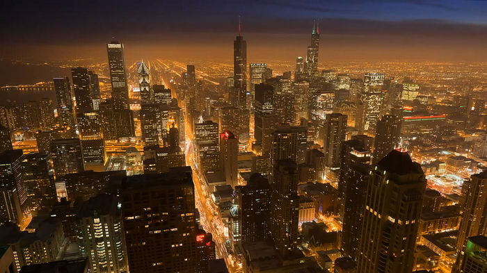 Chicago cityscape at night with illuminated skyscrapers