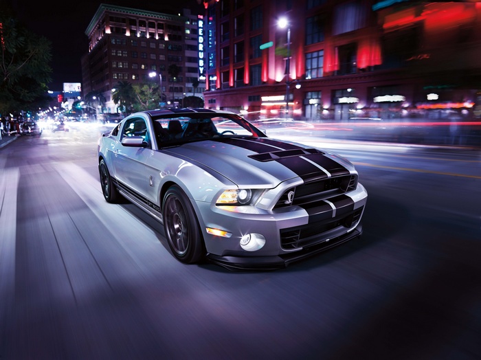 Gray Ford Mustang Shelby GT driving at night