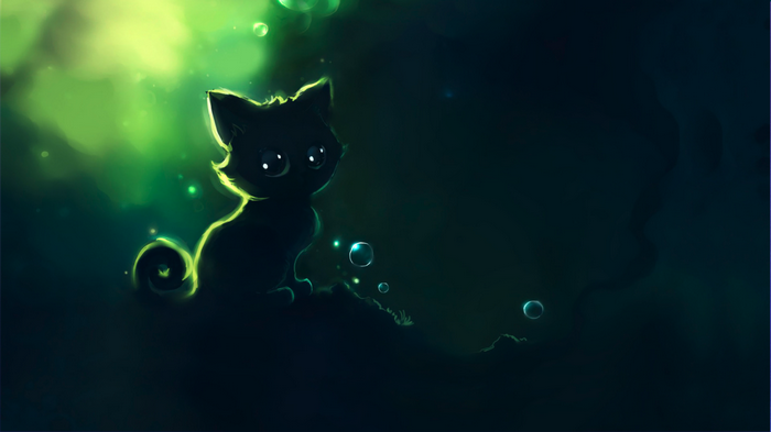 A black kitten with big eyes in a green, glowing environment