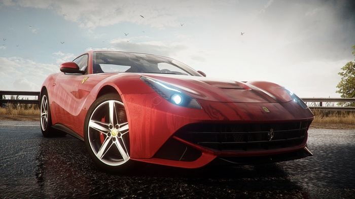 Red Ferrari F12 on a wet road