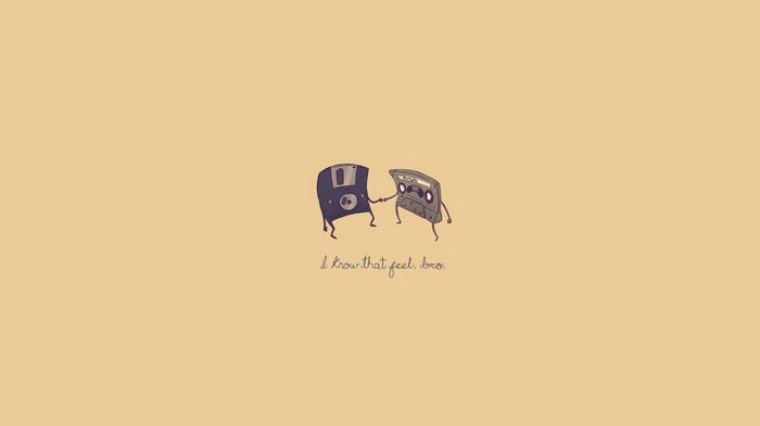 Floppy disk and cassette tape holding hands with text