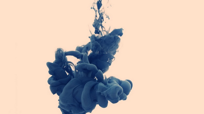 Abstract dark blue ink cloud in water