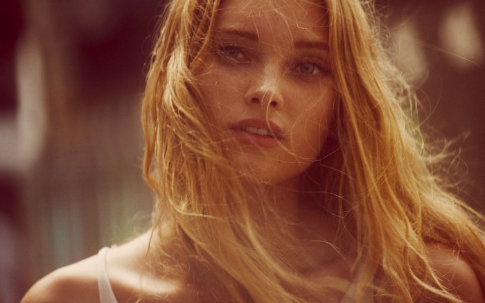 Elsa Hosk with blonde hair blowing in the wind