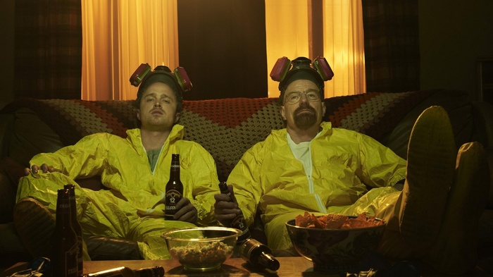 Walter White and Jesse Pinkman in hazmat suits with beer