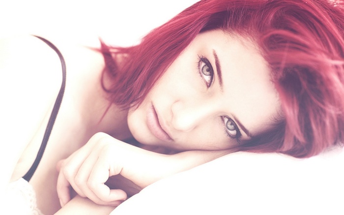 Susan Coffey with Red Hair Lying Down