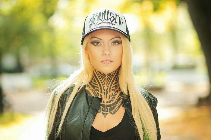 Teya Salat with Neck Tattoo and Cap