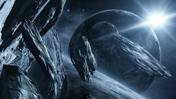 Space scene with planets and asteroids
