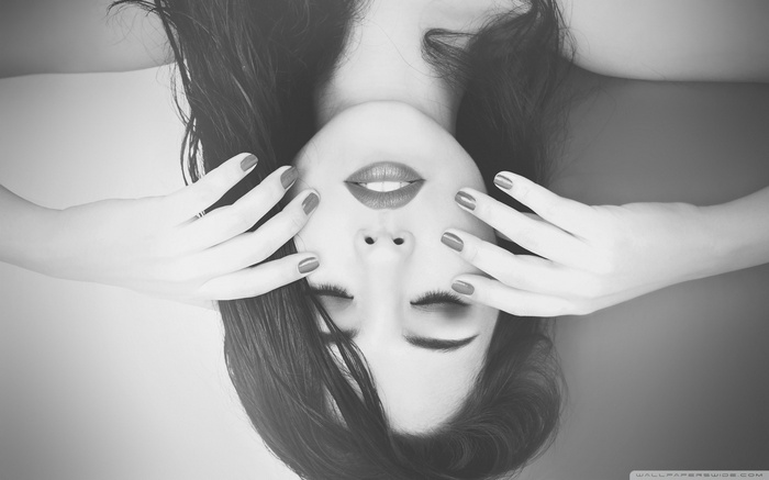 Monochrome portrait of a woman with black hair